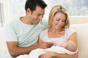 103966679 couple with baby 300x199 Male circumcision: To snip or not to snip?