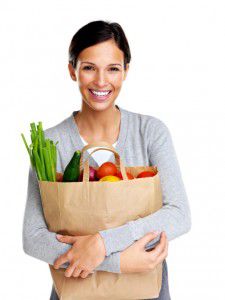 121351396 Happy woman with groceries 225x300 2 weeks pregnant: How to get pregnant and preconception health information