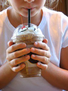 99264066 Girl drinking coffee 225x300 Caffeine: Knowing when to say when