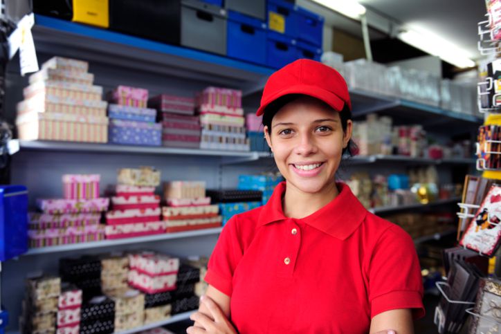 Young woman working in a gift box store.