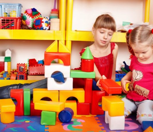 Girls playing with toys