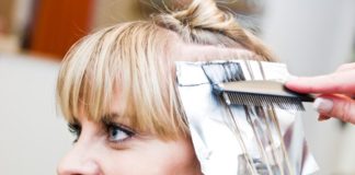 Woman getting hair done