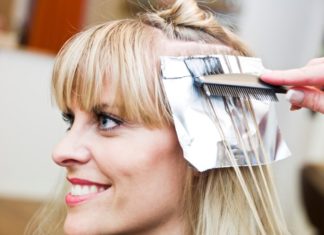 Woman getting hair done