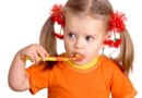 Girl brushing teeth