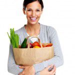 Happy woman with groceries