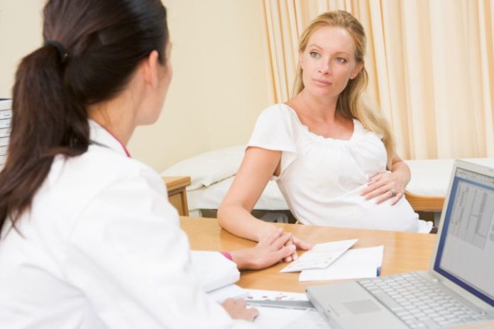 Pregnant woman at doctor's office