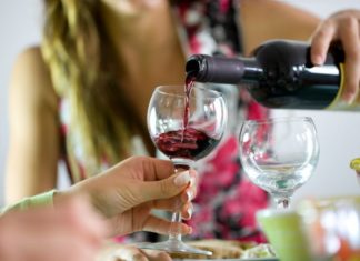 Red wine being poured