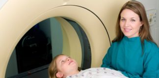 A girl gets an MRI.