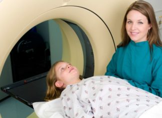 A girl gets an MRI.