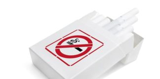 A prop packet of cigarettes with a no smoking sign n the front of the box.