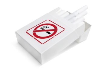 A prop packet of cigarettes with a no smoking sign n the front of the box.