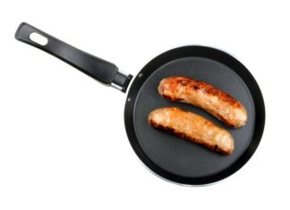 Two sausages in a frying pan.