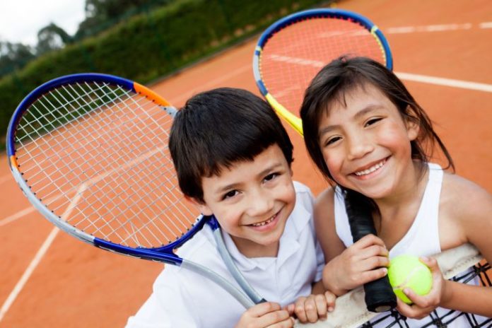 Kids playing tennis