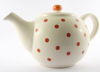 White teapot with orange polka-dots.