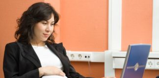 Pregnant woman in office