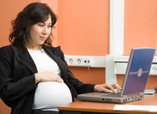 Pregnant woman in office