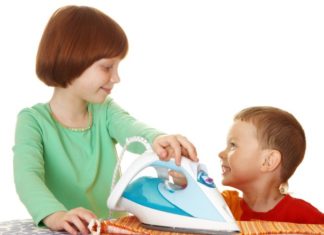 Children ironing.