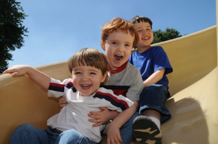 Boys on slide