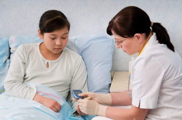 Girl in hospital with doctor