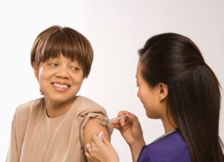 Woman getting flu shot