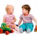 Toddlers playing with toys