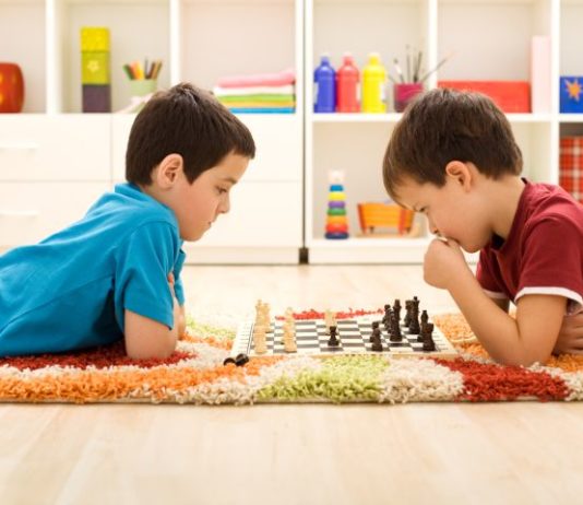 Boys playing chess