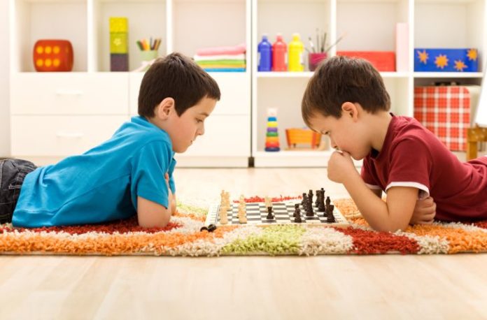 Boys playing chess