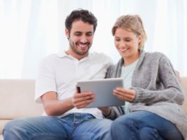 Couple using tablet