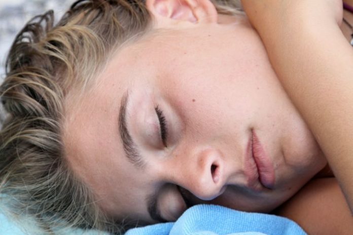 Portrait of a young girl sleeping peacefully