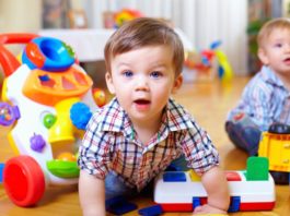 Toddlers playing with toys