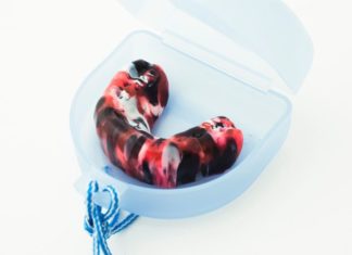 Red, black and white mouth guard