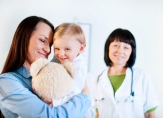 Mother and daughter with doctor