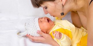 Mother soothing her crying baby