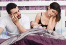 exhausted parents with newborn baby