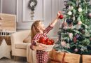 girl-decorating-christmas-tree-holidays-300×200