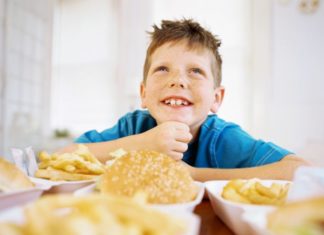 Boy with fast food