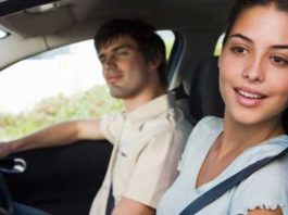 Couple driving a car