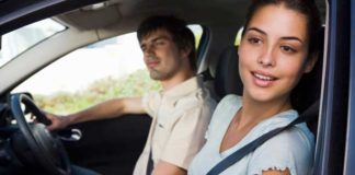 Couple driving a car