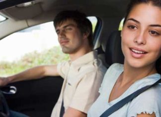 Couple driving a car