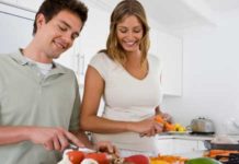 couple preparing vegetables in the kitchen