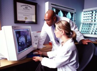Doctors looking at MRI