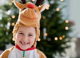 Boy wearing reindeer costume
