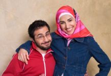 A smiling and playful young couple.