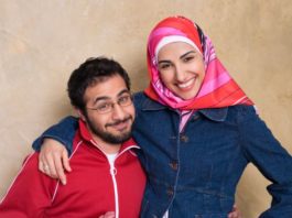 A smiling and playful young couple.