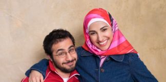 A smiling and playful young couple.