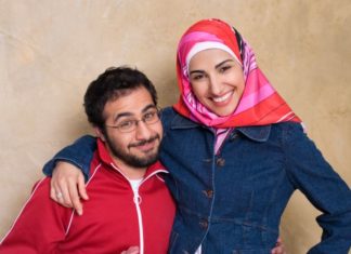 A smiling and playful young couple.