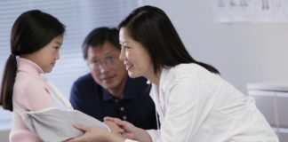 Girl in hospital with doctor