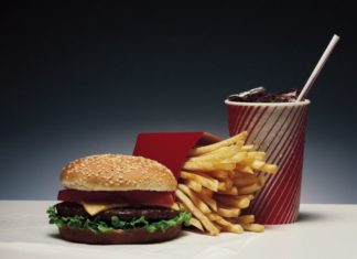 A hamburger, fries and soda.