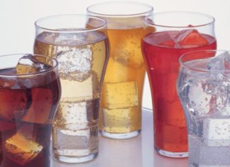 Glasses with ice and colourful sodas