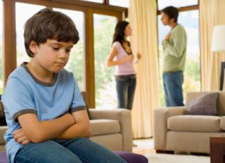 Boy and fighting parents